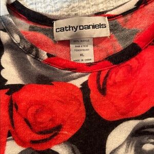 Cathy Daniels Vibrant Red and Black Rose topic